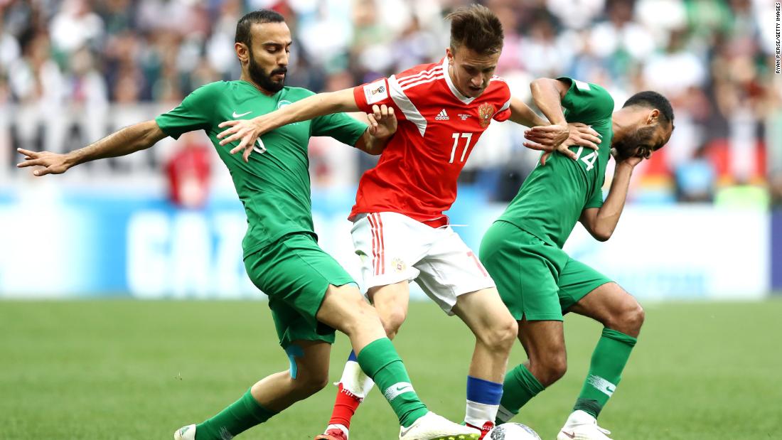 Fedor Smolov fights off two Saudi defenders during the tournament opener, which Russia won 3-0 on June 14. Russia and Saudi Arabia came into the match as the lowest-ranked teams in the tournament.