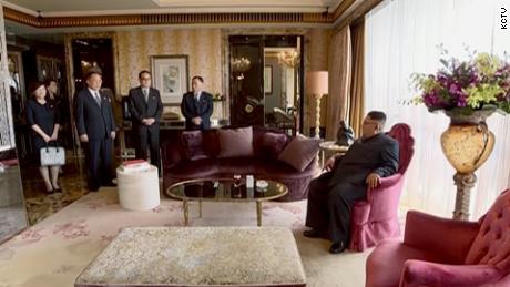 The video showed Kim surrounded by aides at the St. Regis Hotel, Singapore.