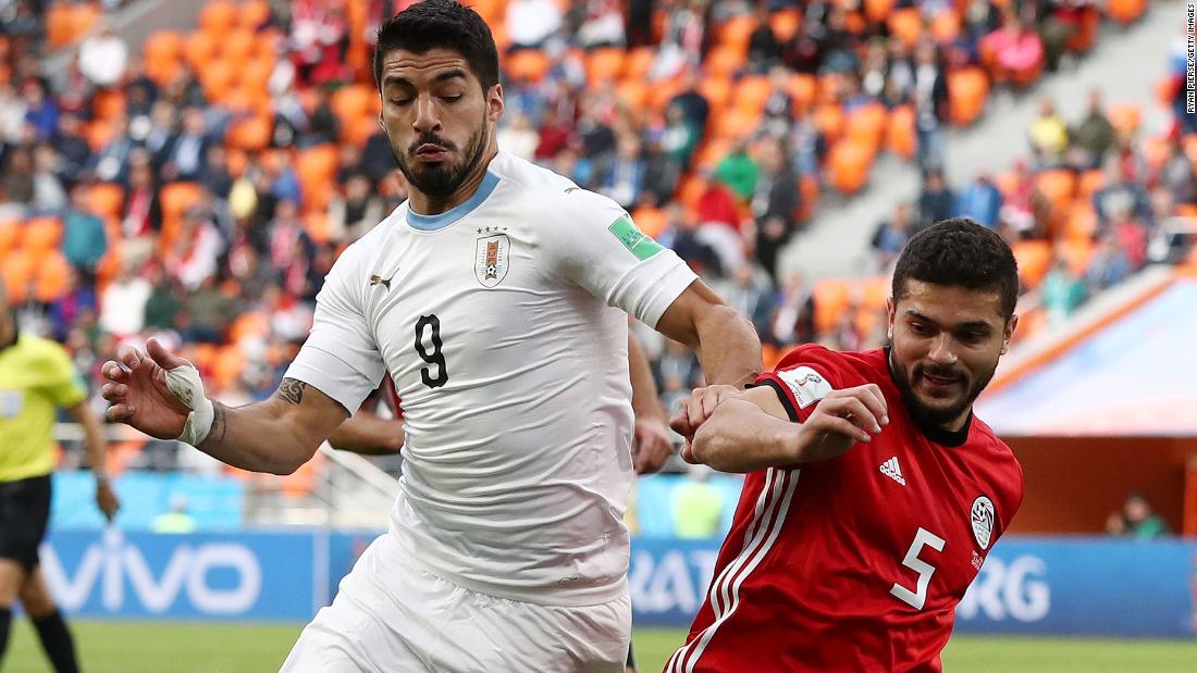 Uruguay&#39;s Luis Suarez, left, and Egypt&#39;s Sam Morsy battle for the ball on June 15. Uruguay won 1-0.