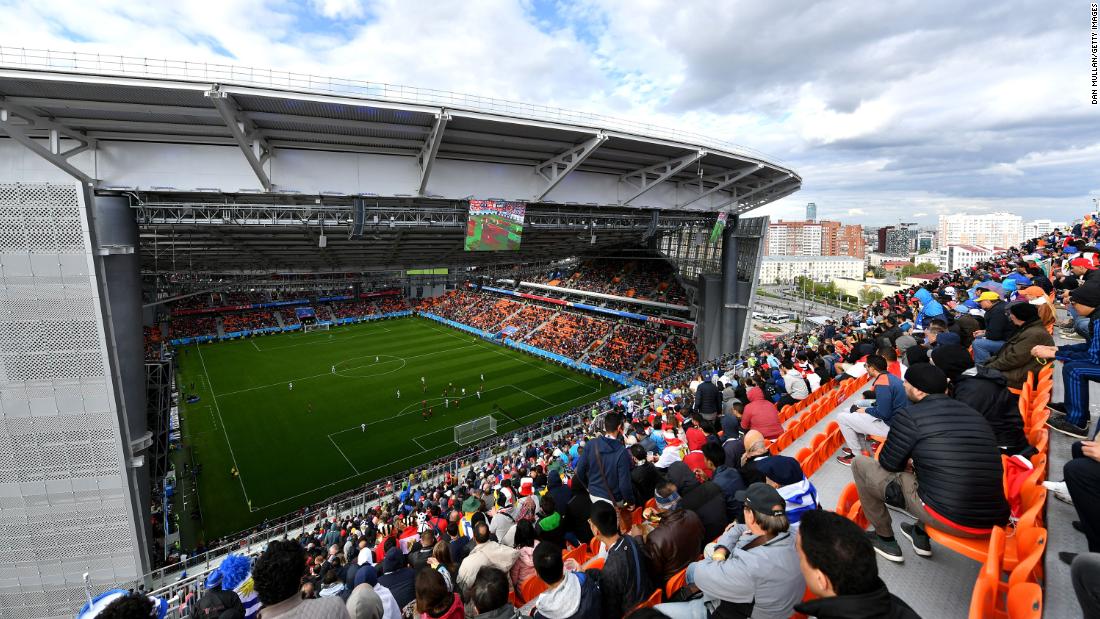 Fans watch the Egypt-Uruguay match from temporary seats set up at the Ekaterinburg Arena. The seats had to be installed to meet FIFA&#39;s minimum-seating requirement.