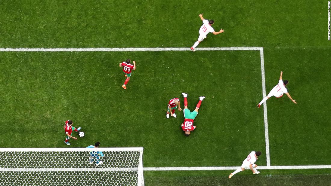 Morocco&#39;s Aziz Bouhaddouz lies on the ground after heading the ball into his own net late in stoppage time on June 15. The whistle was blown just a few moments later, and Iran won 1-0.