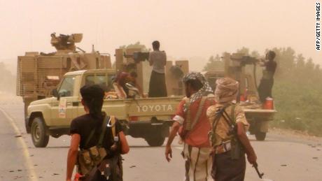 Yemeni pro-government forces gather at the south of Hodeida airport, in Yemen&#39;s Hodeida province on June 15, 2018.