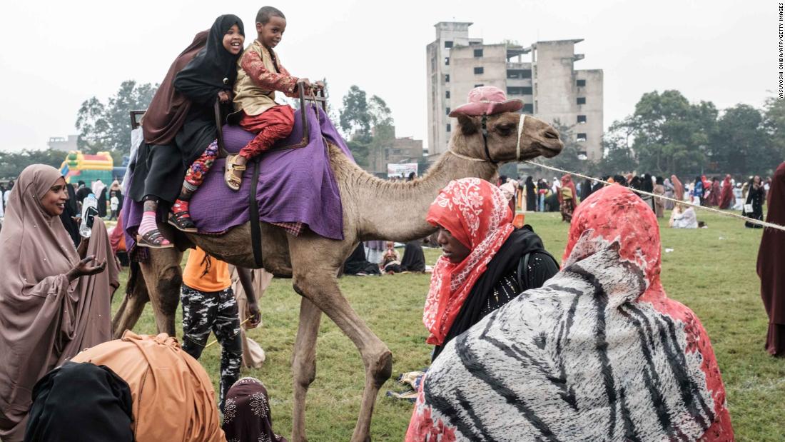 Children take a camel ride after Eid al-Fitr prayers in Nairobi, Kenya.