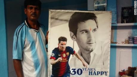 Inside his home, posters of Messi paper the walls of Patra&#39;s home.