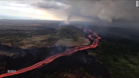 title: Kīlauea Volcano — Fissure 8 Flow: From Vent to Sea duration: 00:01:55 site: Youtube author: null published: Thu Jun 14 2018 19:22:30 GMT-0400 (Eastern Daylight Time) intervention: no description: A helicopter overflight video of the lower East Rift Zone on June 14, 2018, around 6:00 AM, shows lava fountaining at fissure 8 feeding channelized lava flows that flow into the ocean. Lava is still flowing out of fissure 8 unabated and the channel is full. At the start of the video, standing waves in the lava channel can be seen near the vent exit. The channel appears crust-free from vent to the bend around Kapoho Crater. A surface crust forms over the channel as it spreads out during its approach to the ocean. The overflight along the ocea