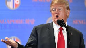 US President Donald Trump speaks at a press conference following the historic US-North Korea summit in Singapore on June 12, 2018. - Donald Trump and Kim Jong Un hailed their historic summit on June 12 as a breakthrough in relations between Cold War foes, but the agreement they produced was short on details about the key issue of Pyongyang&#39;s nuclear weapons. (Photo by Anthony WALLACE / AFP) (Photo credit should read ANTHONY WALLACE/AFP/Getty Images)