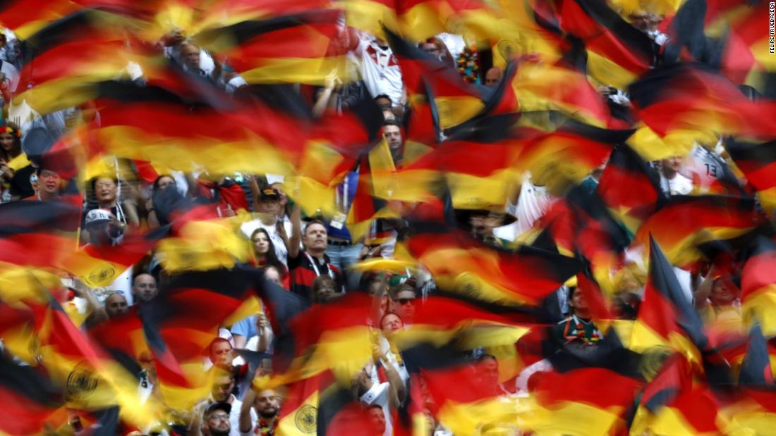 Fans wave German flags before facing off with Mexico.