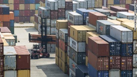 A reach stacker transports a shipping container in a terminal at the Yangshan Deep Water Port in Shanghai, China, on Friday, March 23, 2018. The trade conflict between China and the U.S. escalated, with Beijing announcing its first retaliation against metals levies hours after President Donald Trump outlined fresh tariffs on $50 billion of Chinese imports and pledged there&#39;s more on the way. Photographer: Qilai Shen/Bloomberg via Getty Images