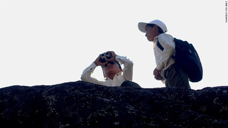 Students birdwatching during the outdoor education program