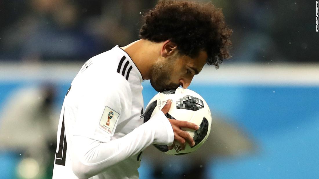 Mohamed Salah kisses the ball before scoring a penalty for Egypt on June 19. Russia won, however, by a final score of 3-1.