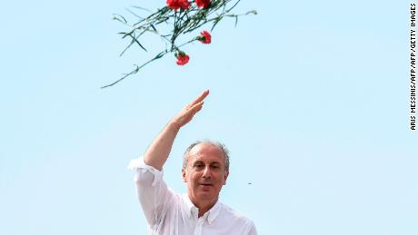Presidential candidate Muharrem Ince throws carnations to his supporters at an election event in Istanbul on June 16.
