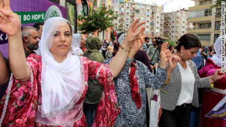 Candidates and supporters dance at the headquarters of the pro-Kurdish HDP party in Diyarbakir on May 24. 