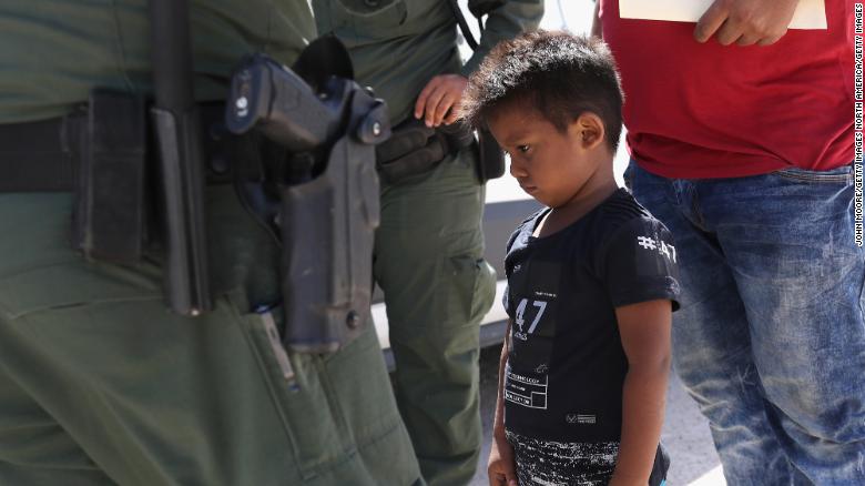 A Honduran boy and father seeking asylum in the US were taken into custody by US Border Patrol in June.