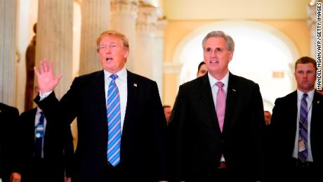 US President Donald Trump (L) walks next to US House Majority Leader Kevin McCarthy (R-CA) after a meeting at the US Capitol with the House Republican Conference in Washington, DC on June 19, 2018. (Photo by Mandel Ngan / AFP)        (Photo credit should read MANDEL NGAN/AFP/Getty Images)