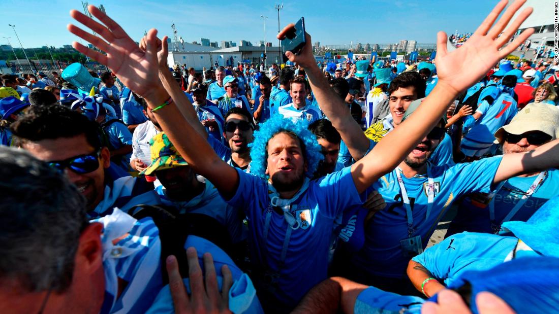 Uruguay fans cheer outside the stadium before the match with Saudi Arabia on June 20.