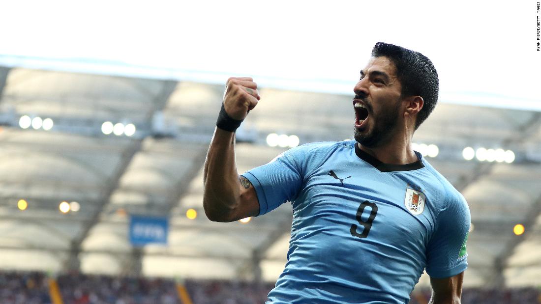 Uruguay&#39;s Luis Suarez celebrates after scoring against Saudi Arabia. It was the only goal of the match, and the final result meant Uruguay and Russia would both advance to the tournament&#39;s knockout stage.