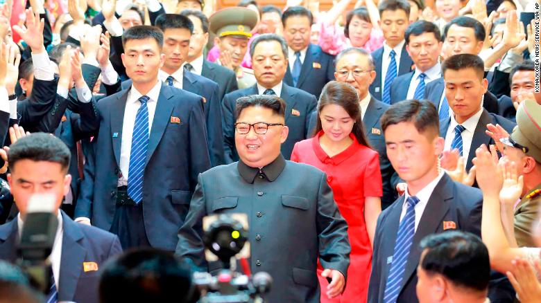 North Korean leader Kim Jong Un and his wife Ri Sol Ju arrive at North Korean Embassy in Beijing, June 20.