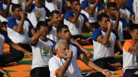 International Yoga Day: India takes a deep breath with Modi on the mat