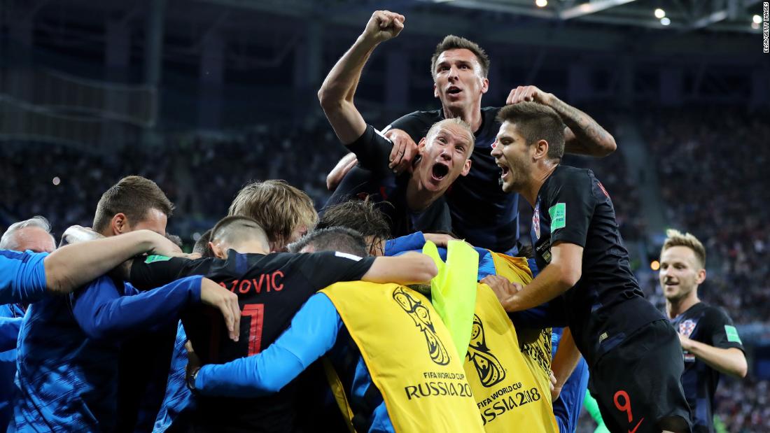 Croatian players celebrate the second goal in their 3-0 victory over Argentina on June 21. The victory clinched them a spot in the knockout stage.