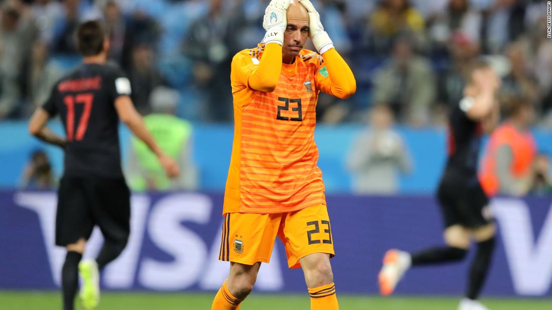 Willy Caballero is dejected after his flubbed clearance gifted Croatia its first goal.