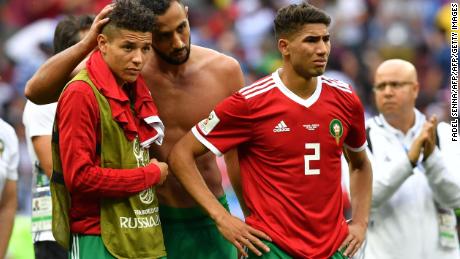 (From L) Morocco's midfielder Amine Harit, Morocco's defender Mehdi Benatia and Morocco's defender Achraf Hakimi react at the end of the Russia 2018 World Cup Group B football match between Portugal and Morocco at the Luzhniki Stadium in Moscow on June 20, 2018. (Photo by FADEL SENNA / AFP) / RESTRICTED TO EDITORIAL USE - NO MOBILE PUSH ALERTS/DOWNLOADS        (Photo credit should read FADEL SENNA/AFP/Getty Images)