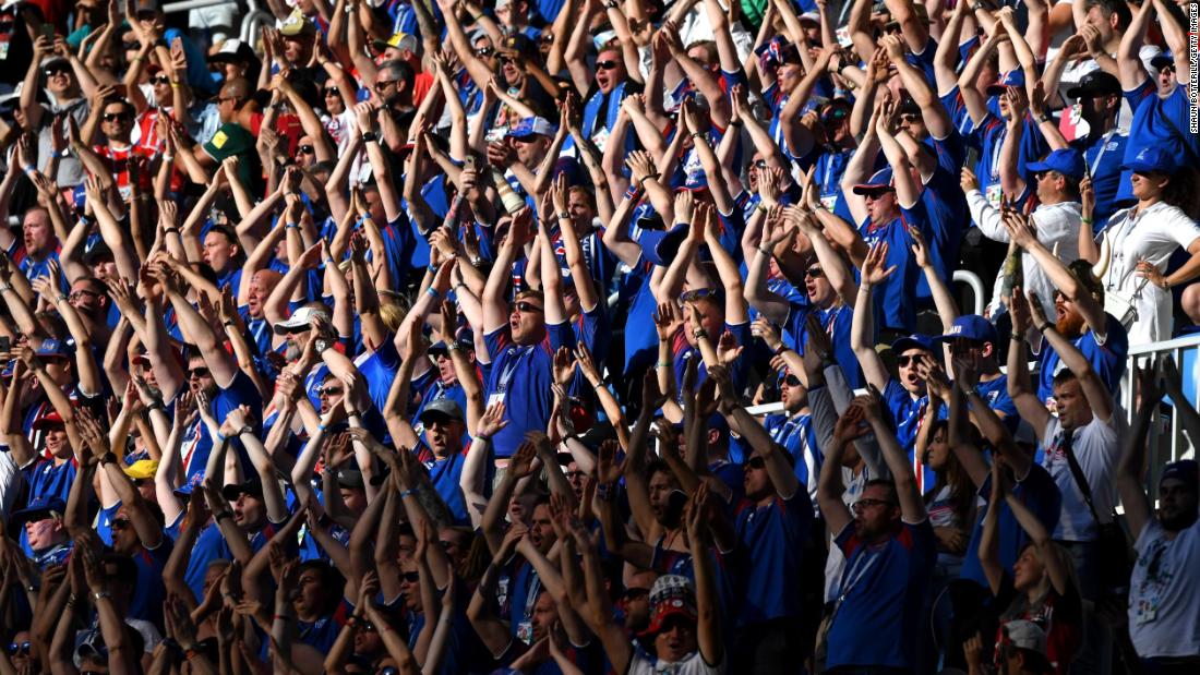 Iceland fans perform their famous viking clap.