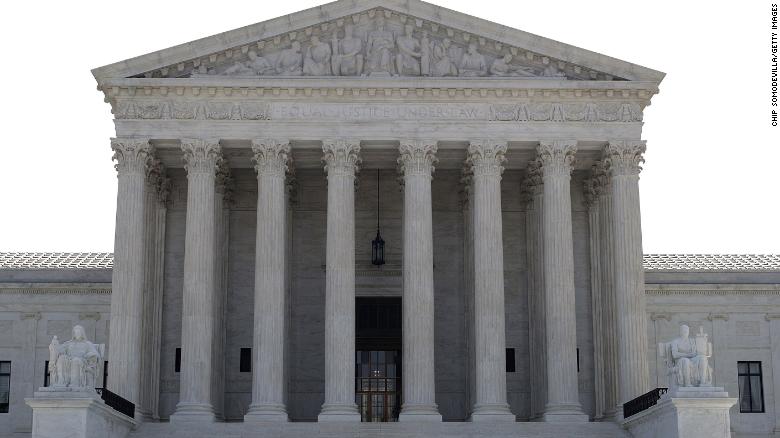 Visitors line up outside the U.S. Supreme Court plaza before the court handed down decisions June 18, 2018 in Washington, DC.  (Photo by Chip Somodevilla/Getty Images)