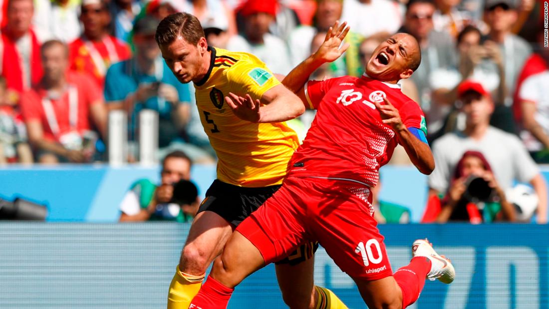 Belgium&#39;s Jan Vertonghen, left, challenges Tunisia&#39;s Wahbi Khazri.