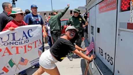 Demonstrator Martha Mercado tried to stop a bus with immigrant children outside a Border Patrol processing center in McAllen, Texas. 