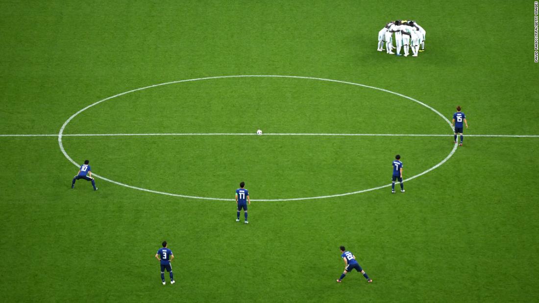 Senegalese players huddle up before the second half of their match against Japan on June 24. The two teams tied 2-2.