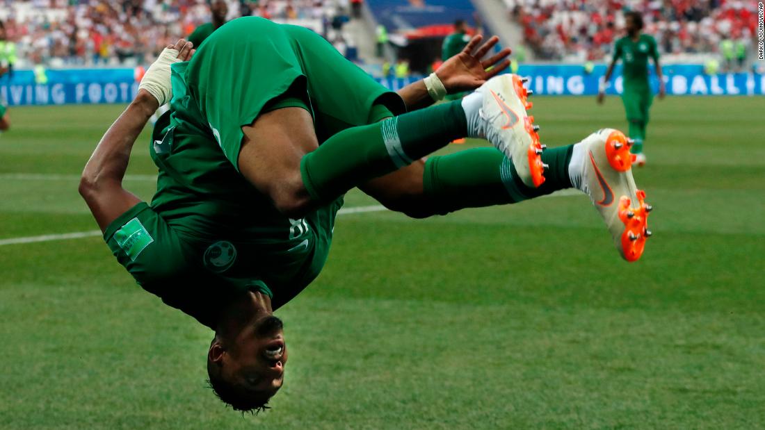 Salem Al-Dawsari celebrates with a flip after scoring the match-winning goal against Egypt.