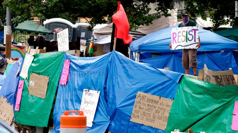 A encampment with the Occupy ICE movement is grown in front of Portland&#39;s U.S. Immigration and Customs Enforcement field offices. 