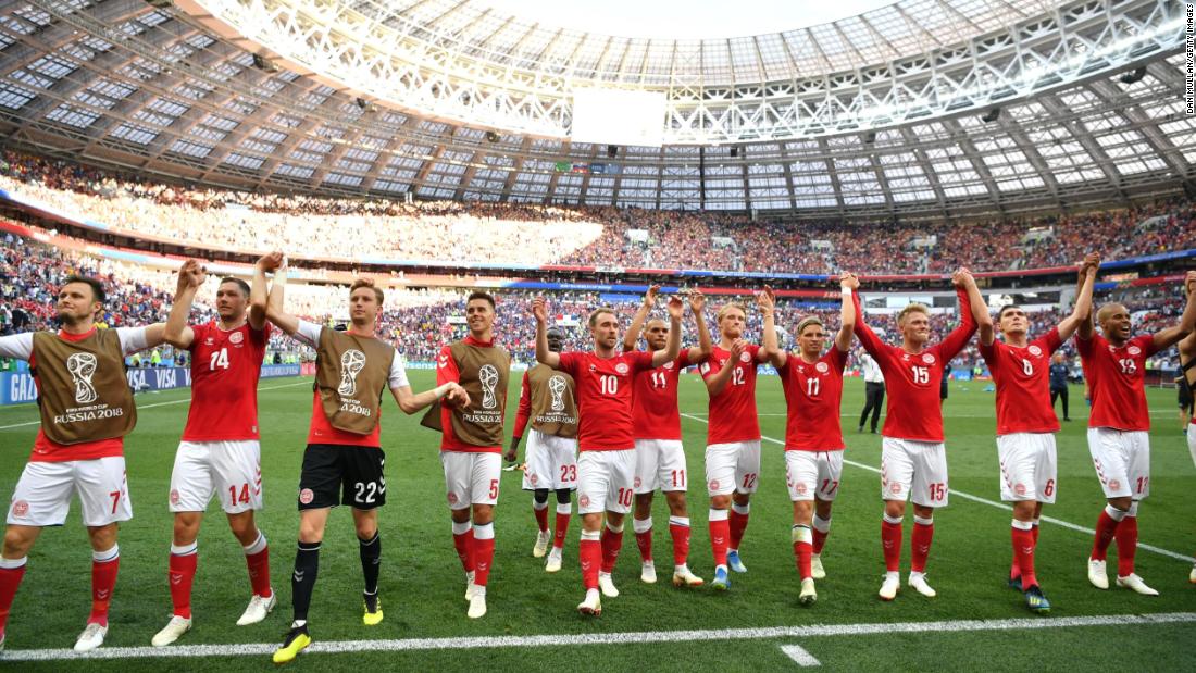 Danish players acknowledge fans after their scoreless draw with France on June 26. Both teams advanced to the knockout stage.