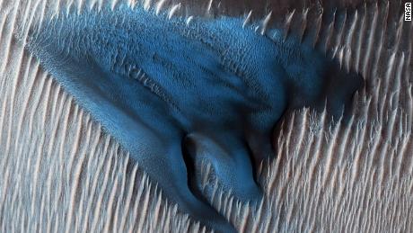 A camera on an orbiter captured this sand dune on Mars. 