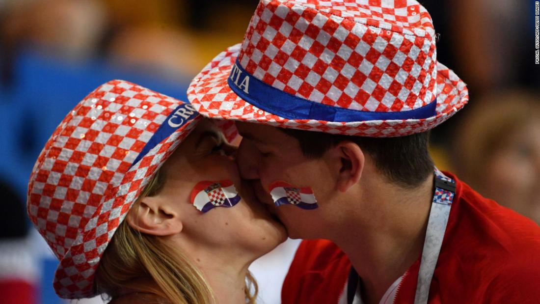 Croatia supporters kiss ahead of the match against Iceland.