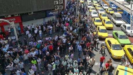 Iranian protesters gather during a demonstration in central Tehran on June 25, 2018.