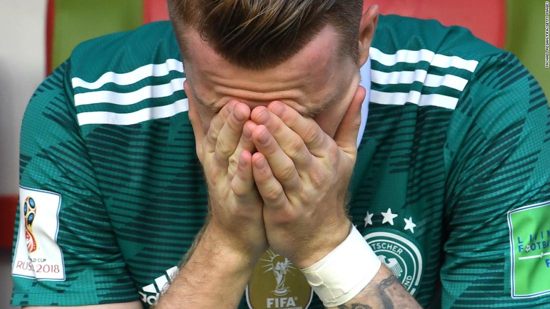 Germany&#39;s Marco Reus reacts after his team lost to South Korea and was knocked out of the World Cup on June 27. The defending champions lost 2-0 and finished at the bottom of Group F.