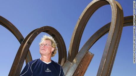 Rives poses next to one his creations at Sydney's Sculpture by the Sea exhibition in 2006. 