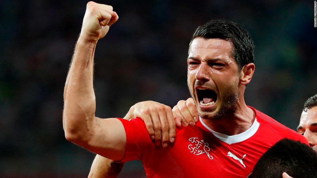 Switzerland&#39;s Blerim Dzemaili celebrates after scoring the first goal in his team&#39;s 2-2 draw with Costa Rica on June 27. Switzerland finished second in its group to advance to the knockout stage.