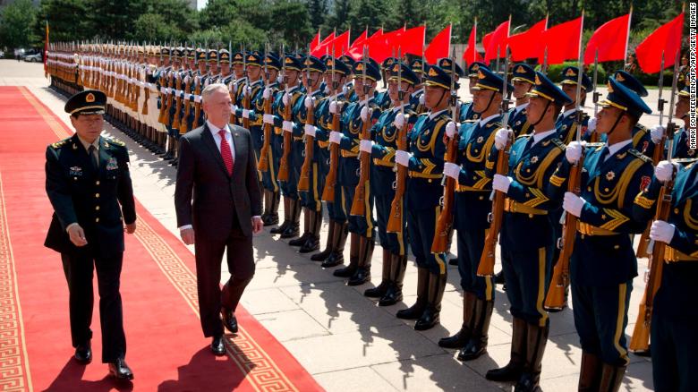 US Defence Secretary Jim Mattis and China&#39;s Defence Minister Wei Fenghe inspect and honour guard during a welcome ceremony at the Bayi Building in Beijing on June 27, 2018.