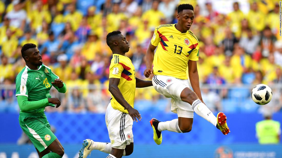 Colombian defender Yerry Mina controls the ball during a match against Senegal on June 28. Mina headed in a second-half goal to lift his team to a 1-0 victory -- and first place in Group H.