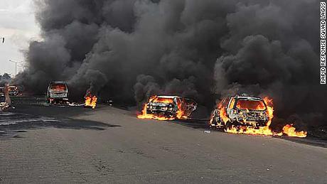 Lagos fire kills at least 9 and sets dozens of cars ablaze after oil tanker explosion