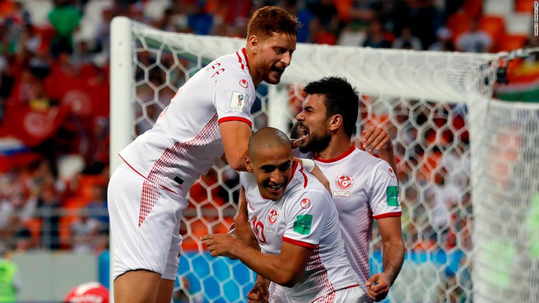 Tunisia&#39;s Wahbi Khazri, center, celebrates with his teammates after scoring the winning goal against Panama on June 28. Tunisia won 2-1.