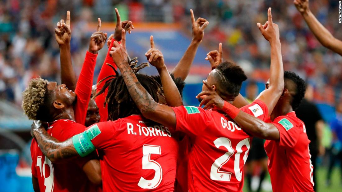 Panama players celebrate after an own goal gave them an early lead against Tunisia.