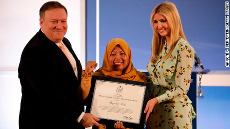 Secretary of State Mike Pomeo and Special Advisor to the President Ivanka Trump present Maizidah Salas of Indonesia with an award for her advocacy work during an event marking the release of the Trafficking in Persons report at the State Department June 28, 2018 in Washington, DC.