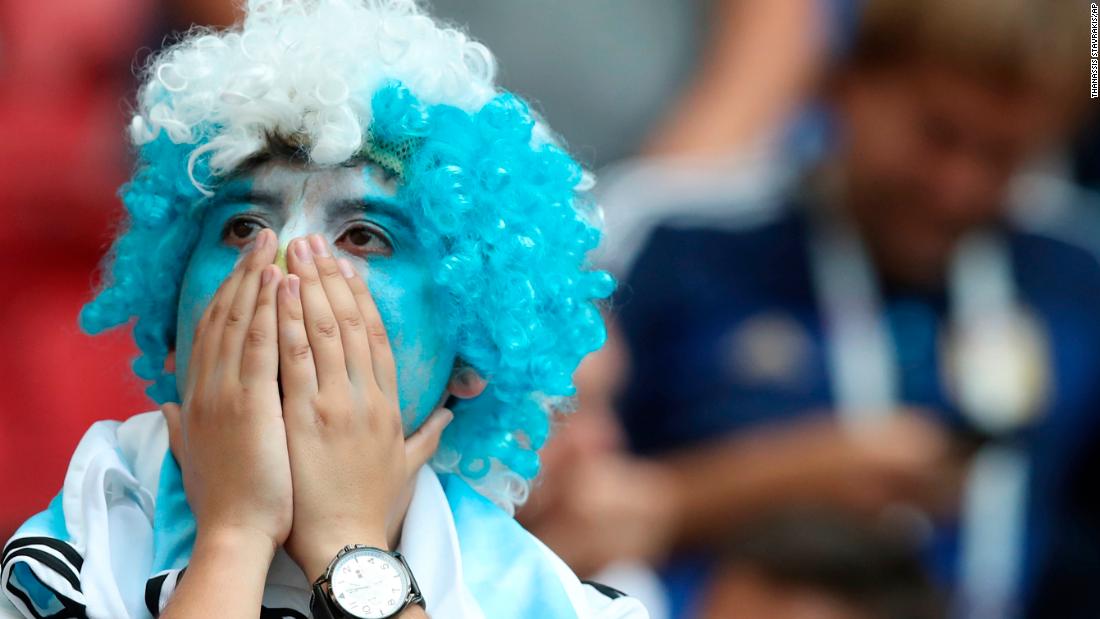 An Argentina fan reacts after the match.