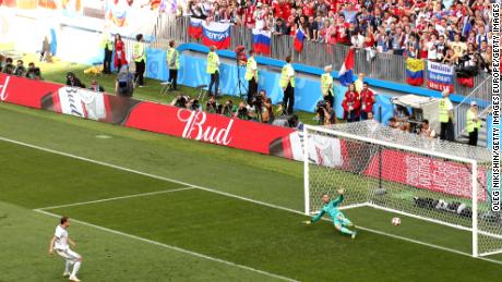 Dzyuba scores from the spot, his third goal of the tournament