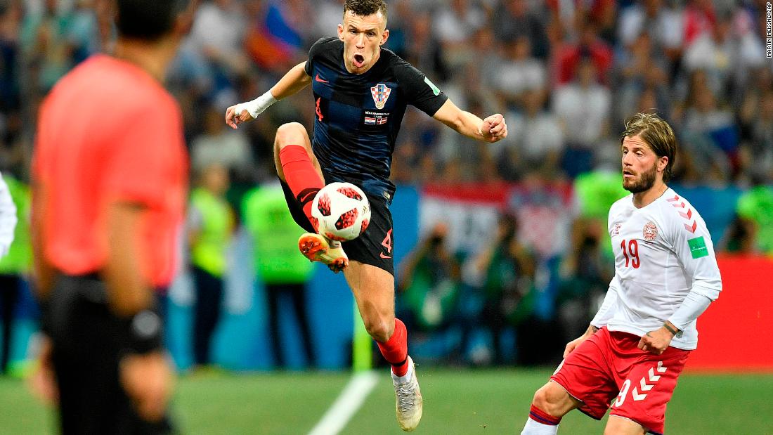 Croatia&#39;s Ivan Perisic stops the ball during the Denmark match.
