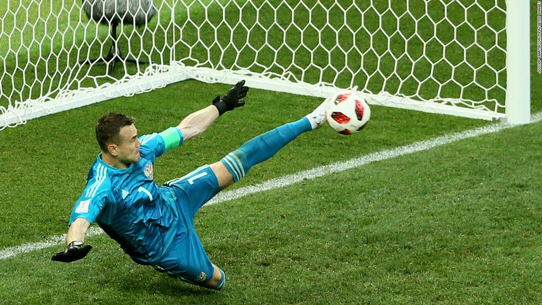 Goalkeeper Igor Akinfeev saves an Iago Aspas penalty to give Russia an upset victory over Spain in the round of 16. The match went to penalties after ending 1-1.