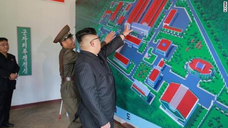 A photograph released by North Korean state media last year showing Kim inspecting an artist&#39;s rendition of the purported facility.